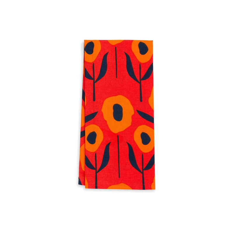 Screen Printed Orange and Navy Poppies Tea Towel on a field of red. Misha Zadeh for 180 Degrees.