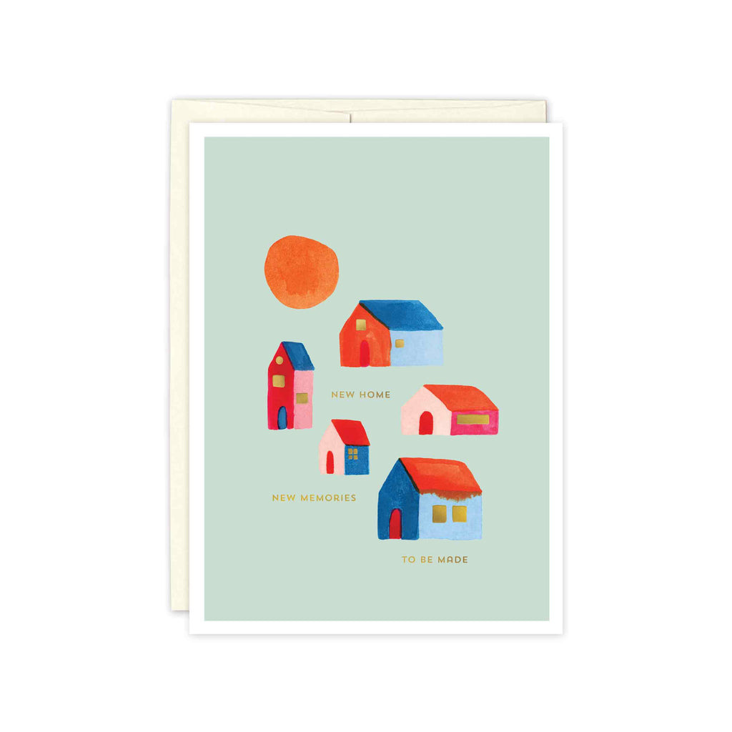 red, orange, blue, and pink houses and a large orange sun on a background of soft turquoise blue. Gold text reads, "new home, new memories to be made"