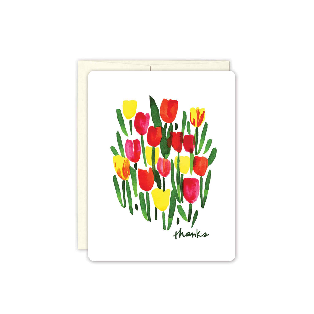Pink, Red, and Yellow gestural painted tulips on a white background. Set of boxed greeting cards. Hand lettered 'thanks' greeting in bottom right corner.