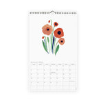 Misha Zadeh 2023 calendar, august spread featuring red and pink poppies on a field of bright white