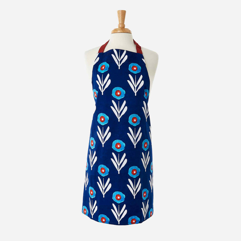 Hand screen printed 100% cotton Blue Poppies Apron with White stems and Navy Blue Background. Misha Zadeh for 180 Degrees
