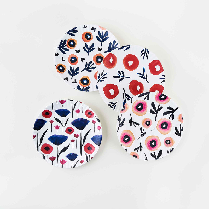 Misha Zadeh Poppies Melamine Plates featuring Inky Poppies, Peachy Rose Poppies, Poppy Love, and Royal Garden. 9" plates on a plain white background