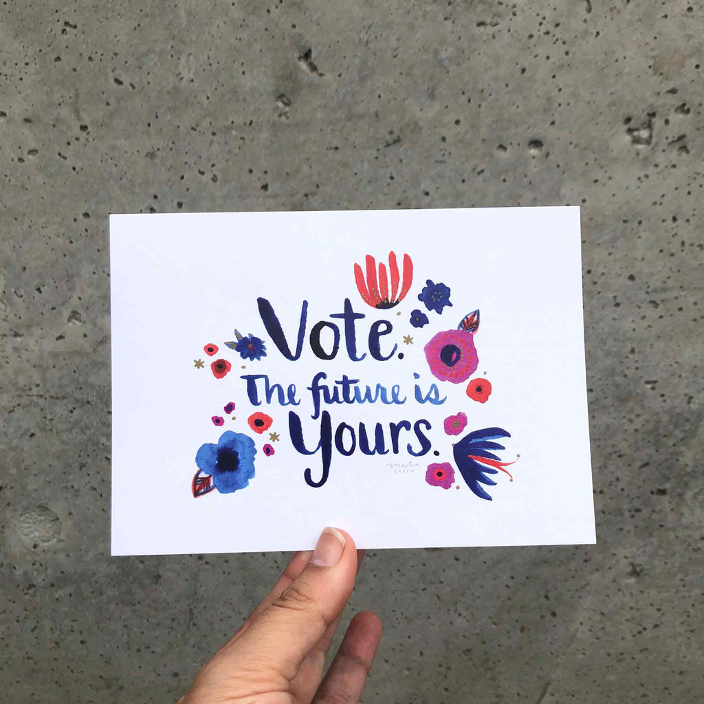 Misha Zadeh Vote - The future is yours watercolor artwork postcard against concrete wall