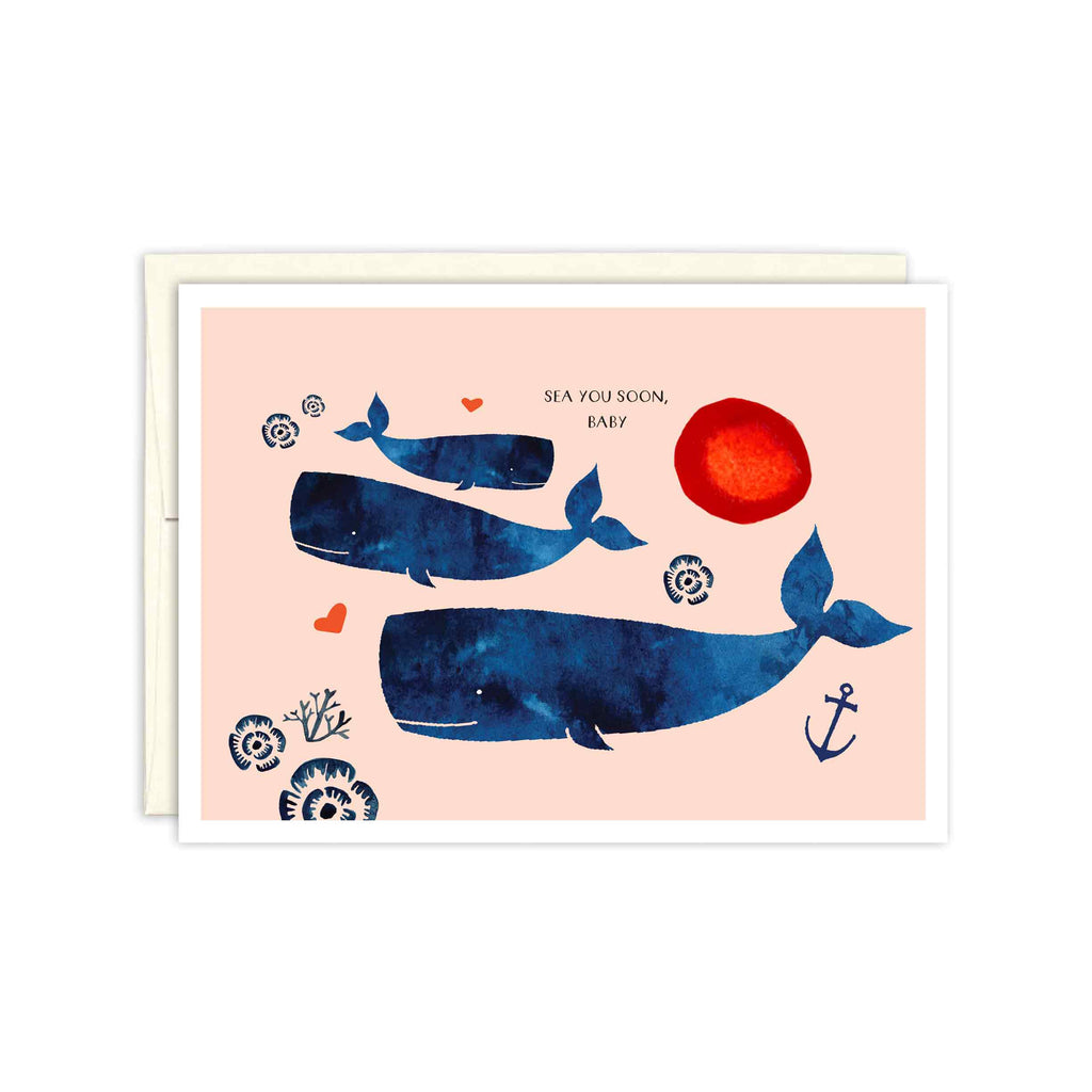 Three Blue Whales in descending sizes, representing two parents and a baby on a field of pale pink. A red sun and hearts are in the background, as well as blue coral and an anchor. Text reads, "sea you soon, baby"