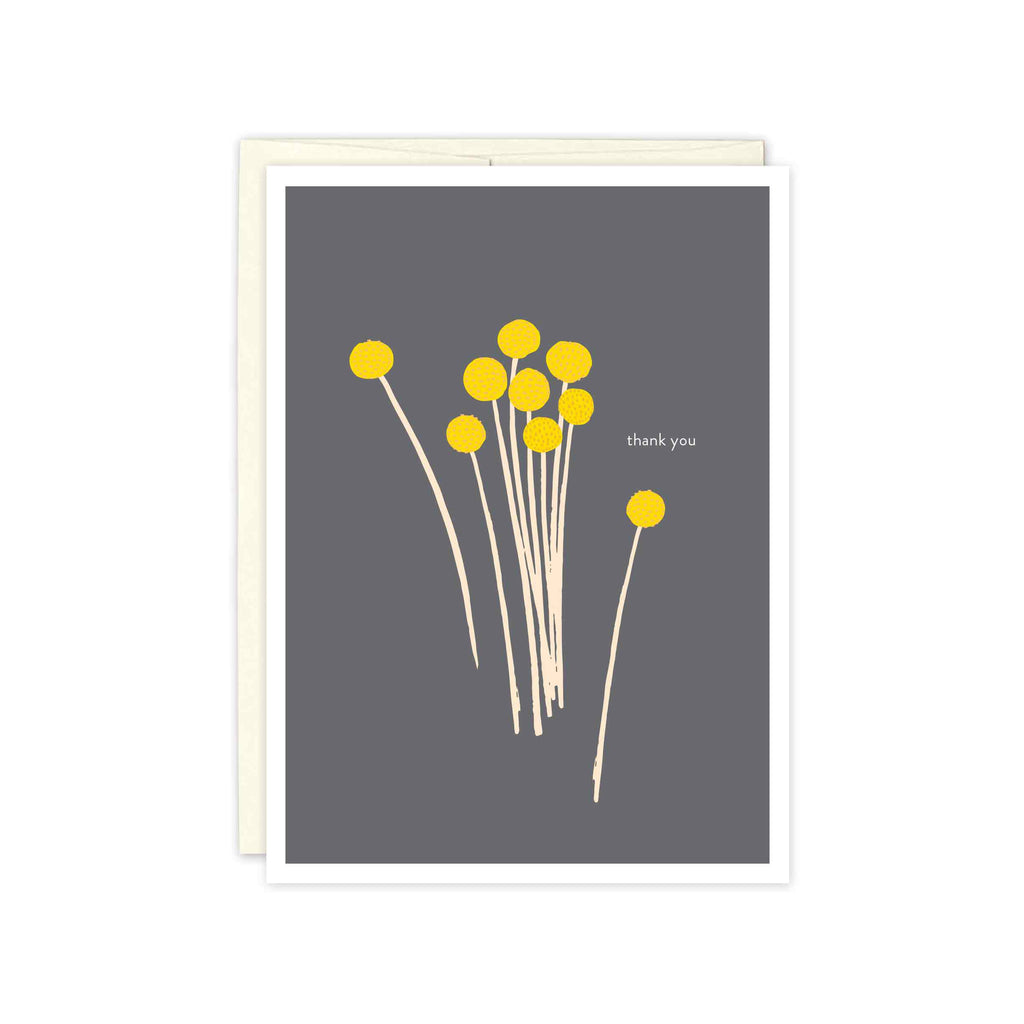 Yellow craspedia, also known as billy balls, on a lovely charcoal gray background with the words thank you in white. Misha Zadeh for Biely and Shoaf. Pantone Colors of the Year 2021