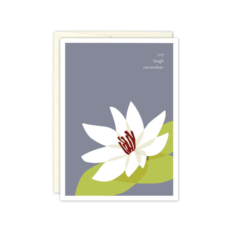 White Water Lily and Green Lily Pad on a field of steel blue. The words cry, laugh, remember are written in a lower case, sans serif typeface in the top right of the card