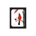 Misha Zadeh Boxed Holiday Cards. Features an acrylic ink painting of a vibrant red cardinal with inky washes of branches, leaves, and bright red berries Exterior greeting is "Joy". Interior is blank. Set of 8 folded cards