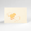 Misha Zadeh illustration of an orange and yellow baby chick cracking out of an egg. Letterpress printed on creamy card stock.