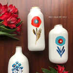 Poppies and Posies Ceramic Bud Vases with gold detailing by Misha Zadeh, featuring floral watercolor artwork. Red and Blue Set of 3