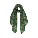 Misha Zadeh Modal Scarf Fern Forest Design. Layered, hand-painted green ferns and orangey red and white berries on a field of rich black. Scarf is tied in a knot.